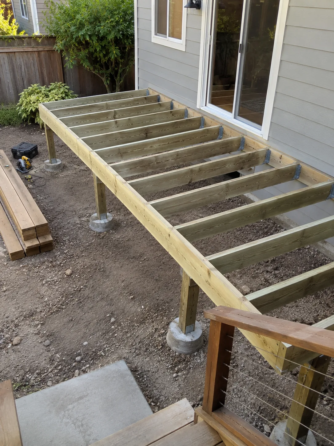 Pressure-treated deck frame prepared for new decking
