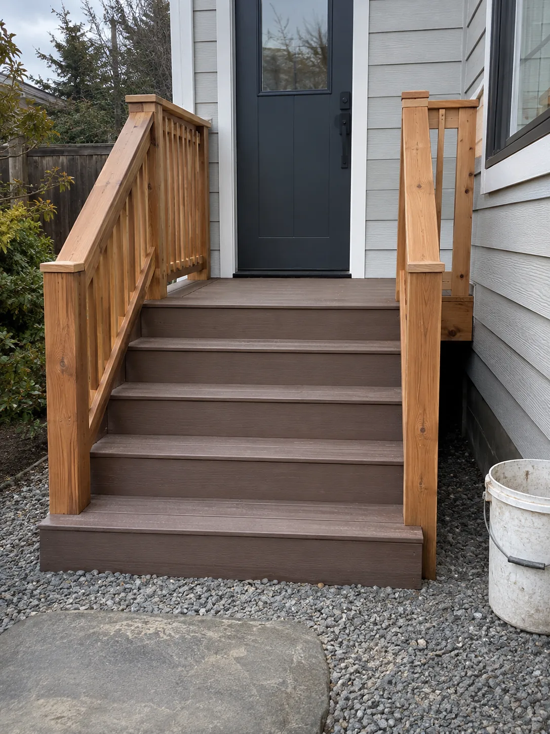 Small composite entry deck with matching stairs